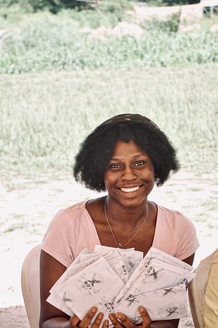 A guest holding printed materials